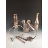 A collection of electroplated and other bar wares, comprising a Parks of London bottle shape