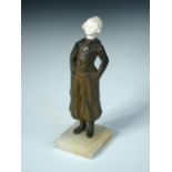 Louis Sosson (French, 1905-1930) a bronze and ivory figure of a Dutch boy, modelled standing,