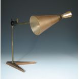 A mid 20th century copper and brass desk lamp, the double ended conical lamp to adjustable brass