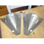 A pair of triangular chrome wall lights