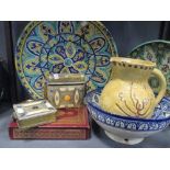 A North African blue and white bowl together with a jug and two Koran holders containing Korans