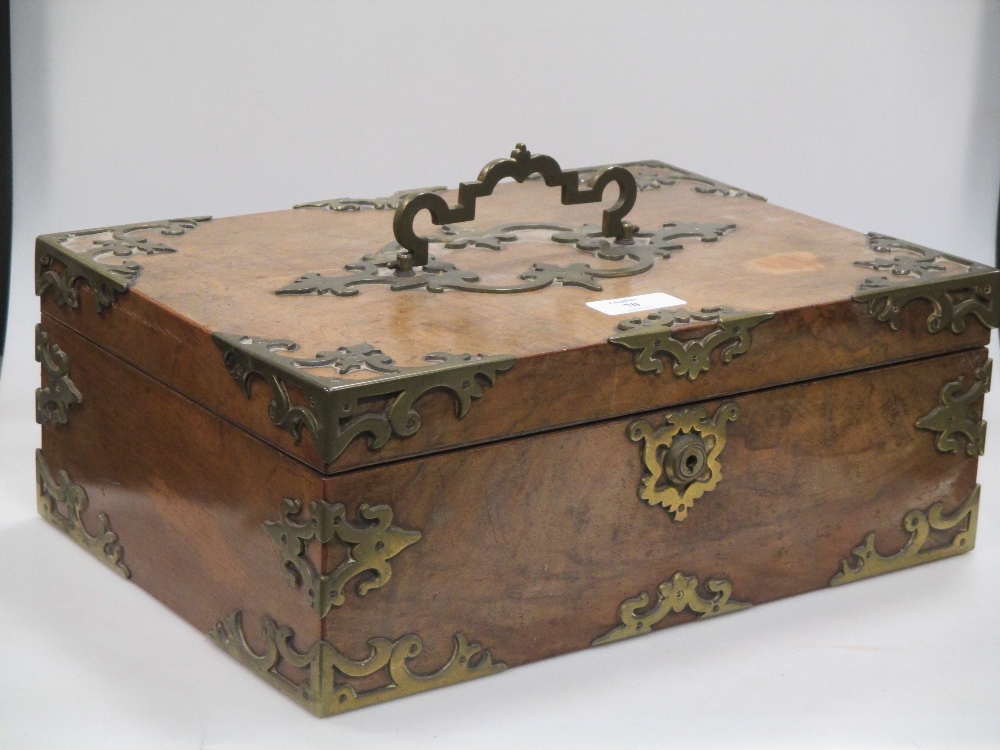 A Victorian brass mounted table box, two small leather cases; two Jennens and Bettridge trays, and