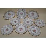 A Royal Crown Derby six setting dessert service, with floral and gilt decoration