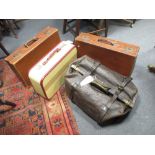 A large leather Gladstone bag and three suitcases (4)