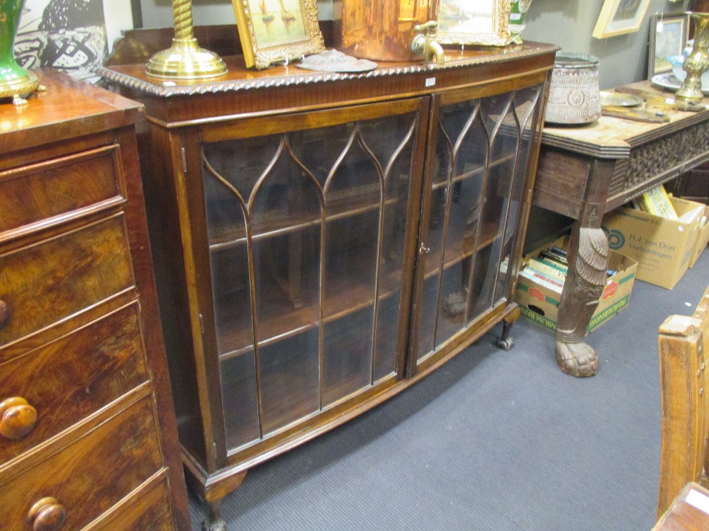 A mahogany bow fronted display cabinet, 132 x 145 x 38cm