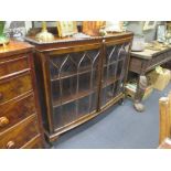 A mahogany bow fronted display cabinet, 132 x 145 x 38cm