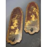 A pair of chinoiserie lacquer back plates