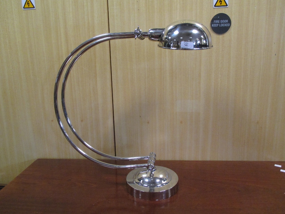 A large half moon shape Art Deco style desk lamp