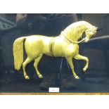A gilt horse, in a maple frame