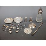 A silver topped cut glass sugar caster, various small silver items