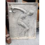 A lead relief profile plaque of a discus thrower