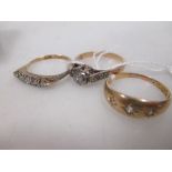 Two 18ct and diamond rings and an illusion set diamond ring set in unmarked yellow metal (3)