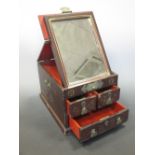 A Chinese maroon lacquer dressing table box
