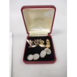 A pair of silver bee cufflinks, another silver pair and a gilt metal pair