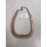 A 9ct fringe necklace with later magnetic barrel clasp (30g)