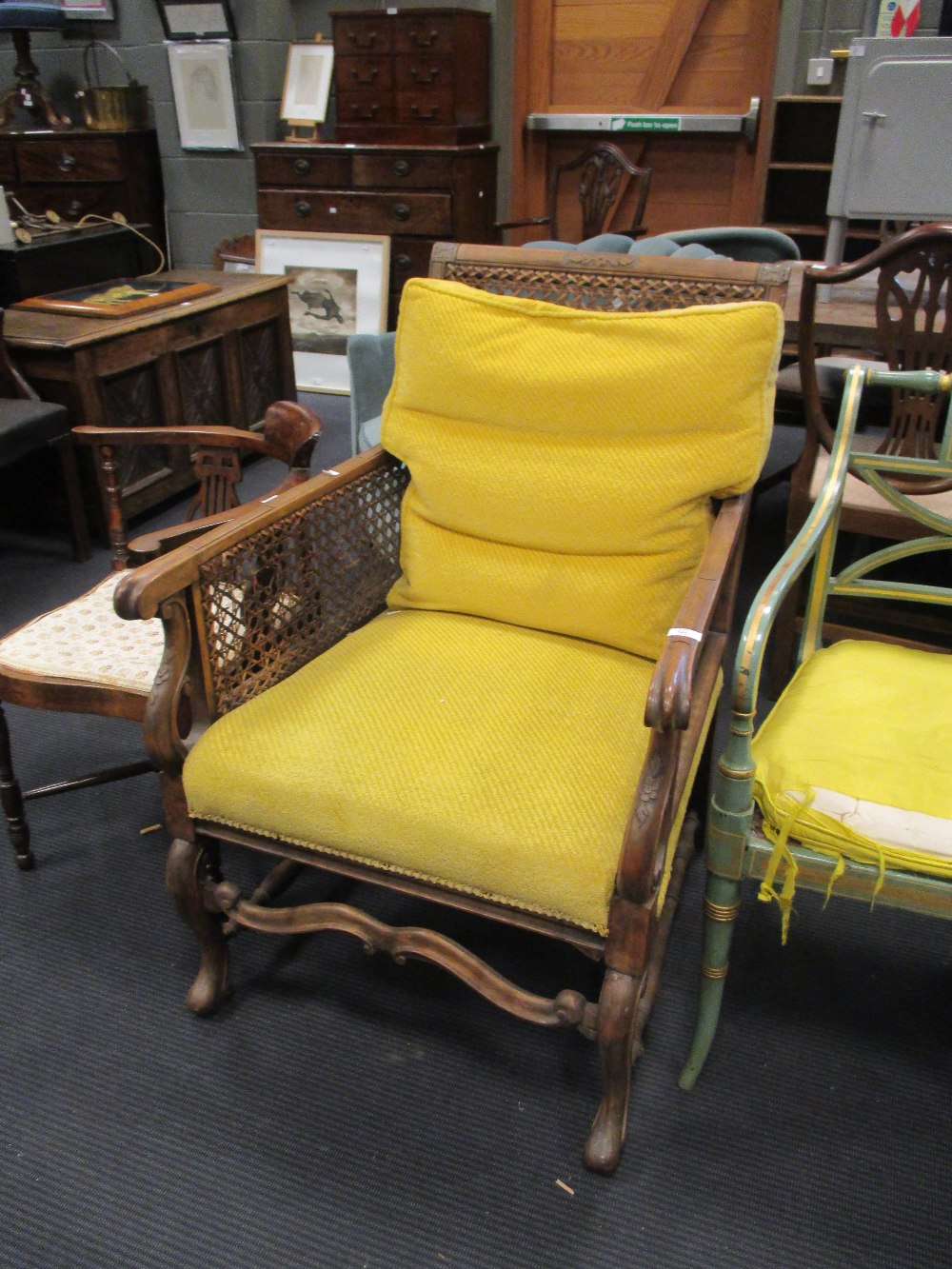 A French mahogany bergere armchair