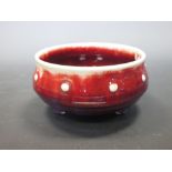 A flambe red bowl Qioalong seal mark, 15cm diameter