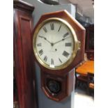 A Seth Thomas mahogany drop dial wall clock