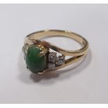 A jade and diamond ring