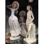 Three Lladro female figures, one of a tennis player (3)