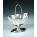 A George III silver sugar basket, by John Emes, London 1798, of navette form raised from a