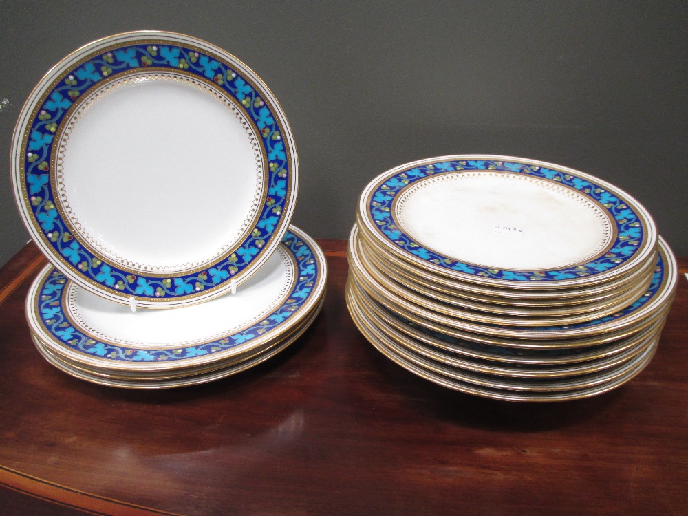 A Minton part dinner service Usual minor chips to rim, rubbing to gilding. One large plate is