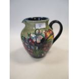 A Moorcroft pottery 'Spring Flowers' pattern jug