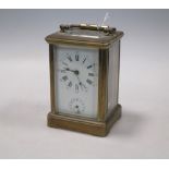 A French gilt brass carriage timepiece No key. Does not appear to keep time. Would assume needs a