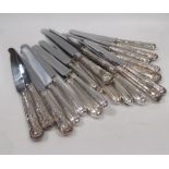 Six silver handled Queen's pattern table knives, (Marks indistinct) (rebladed) and six matching