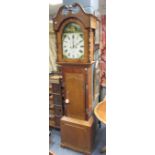 A 19th century eight day oak and mahogany cased longcase clock, the swan neck pediment above the