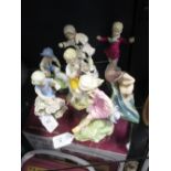 Seven Royal Worcester figures representing the months, modelled by F G Doughty
