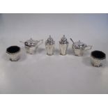 A six piece silver condiment set by Mappin & Webb, Birmingham 1928, of plain octagonal form