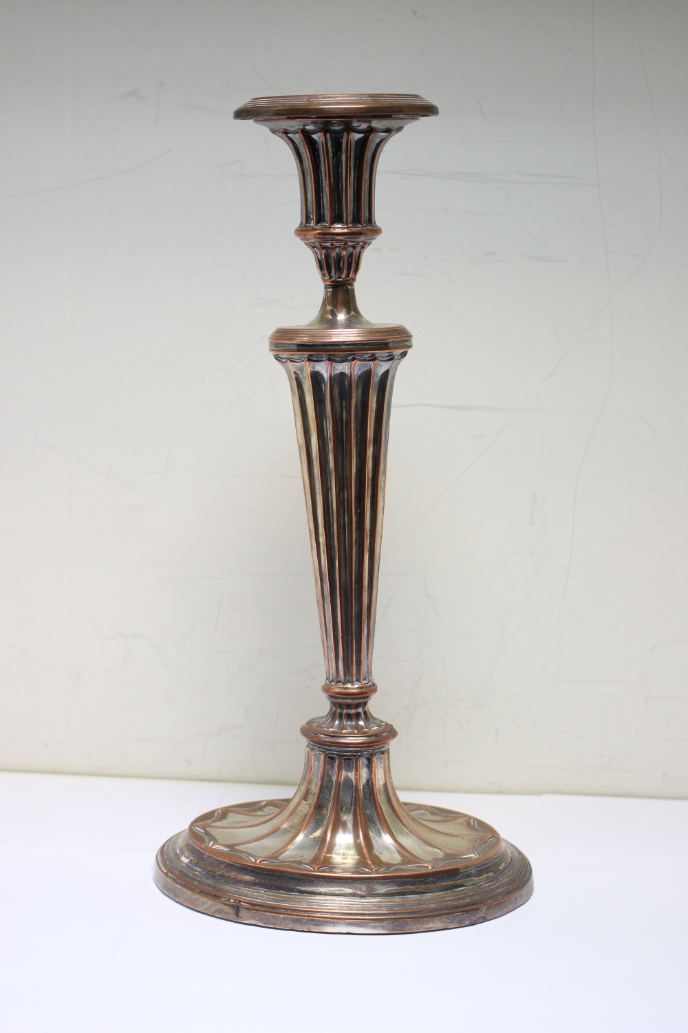 A pair of Old Sheffield plate Adam style candlesticks, with oval fan fluted bases, 31cm high - Image 2 of 2