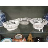 Two creamware baskets together with another Austrian