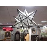 A star shaped hanging ceiling light