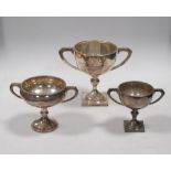 Three similar silver two handled trophy cups