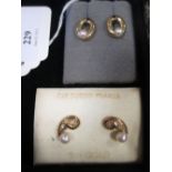 A pair of 9ct paisley shaped diamond and pearl set earstuds and a pair of oval shaped sapphire and