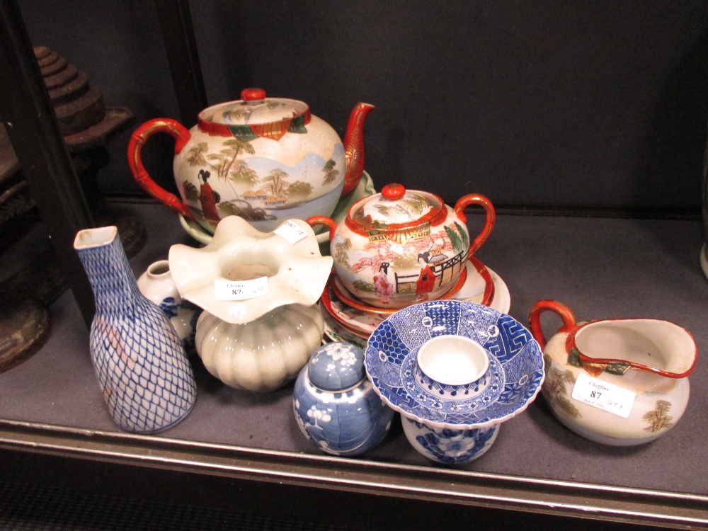 A collection of Japanese and Chinese ceramics, to include: 20th century celadons, blue and white,