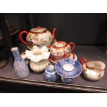 A collection of Japanese and Chinese ceramics, to include: 20th century celadons, blue and white,