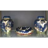 A pair of Carlton ware ginger jars, together with two similar Carlton ware dishes All pieces in good
