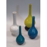 Two Chinese turquoise glazed bottle vases, another yellow, 20.5cm high and a studio ware white