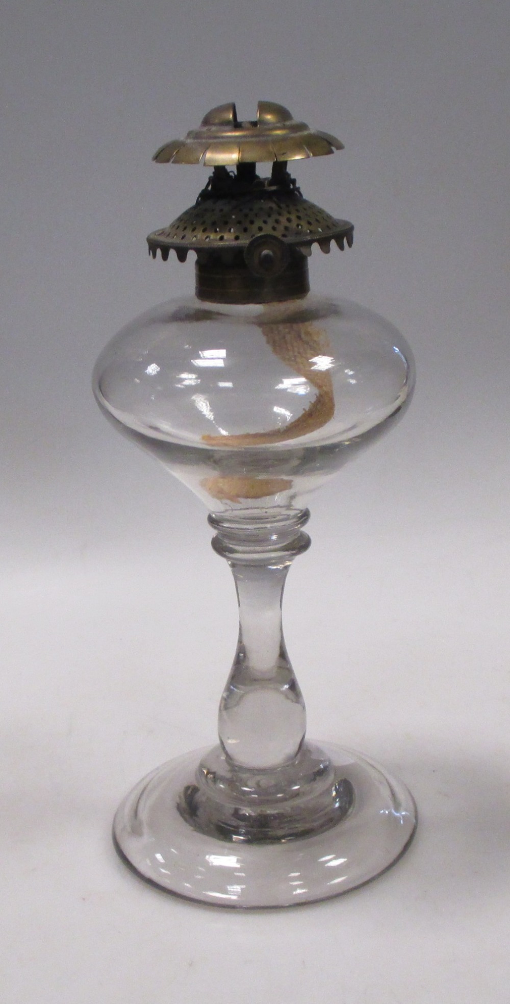 A glass oil lamp