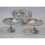 A pair of miniature silver circular top tazze, with beaded borders, on a circular foot, London 1910,