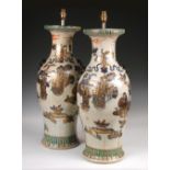 A pair of 19th century Canton baluster vases/lamps, the bronzed mask and ring handles on a