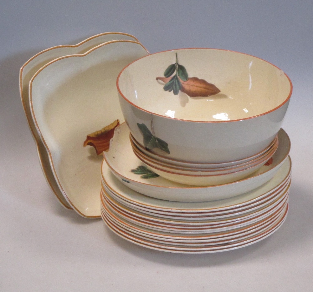 A part set of Wedgwood creamware decorated with botanical studies Several of the dishes have heavy