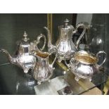 A Victorian three piece electroplated tea set and similar coffee pot (4)