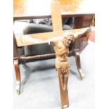 A carved wood crucifix, together with a towel airer (2)