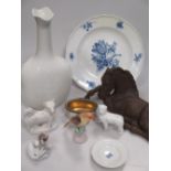 A Bottger 'Steinzug' reclining foal, Meissen blue and white floral plate, Rosenthal cat, two dog