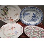 Two 18th century famille rose dishes, 37cm wide, a Canton ovale dish and another blue and white,