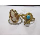 An oval lava cameo brooch in a yellow metal mount, a pair of 9ct cameo earrings (cased), a cameo